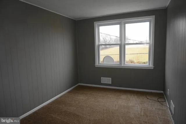 an empty room with a window