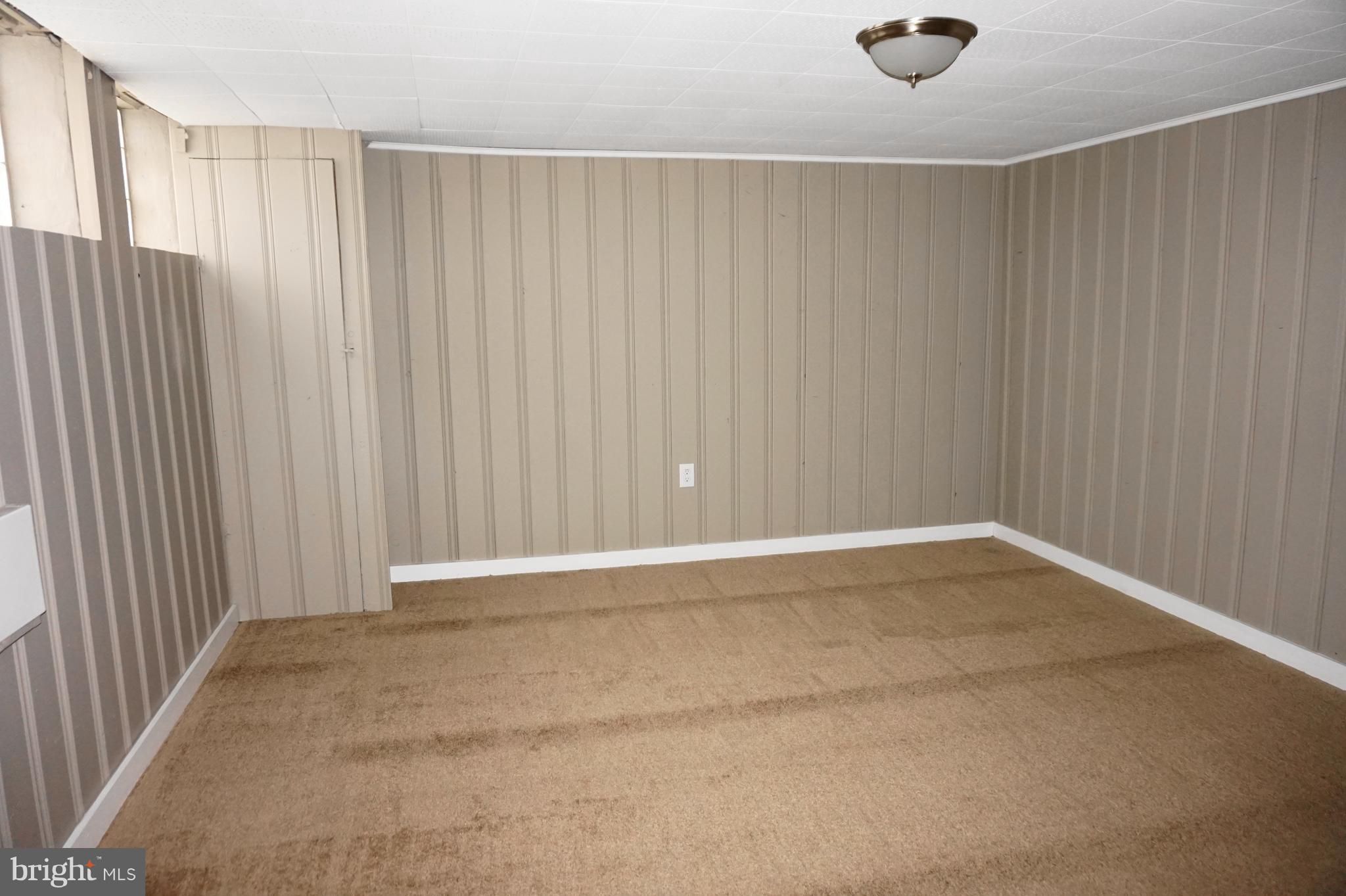 7459 School Avenue Dundalk, MD 21222 - Photo 20 of 23 a view of an empty room with a window