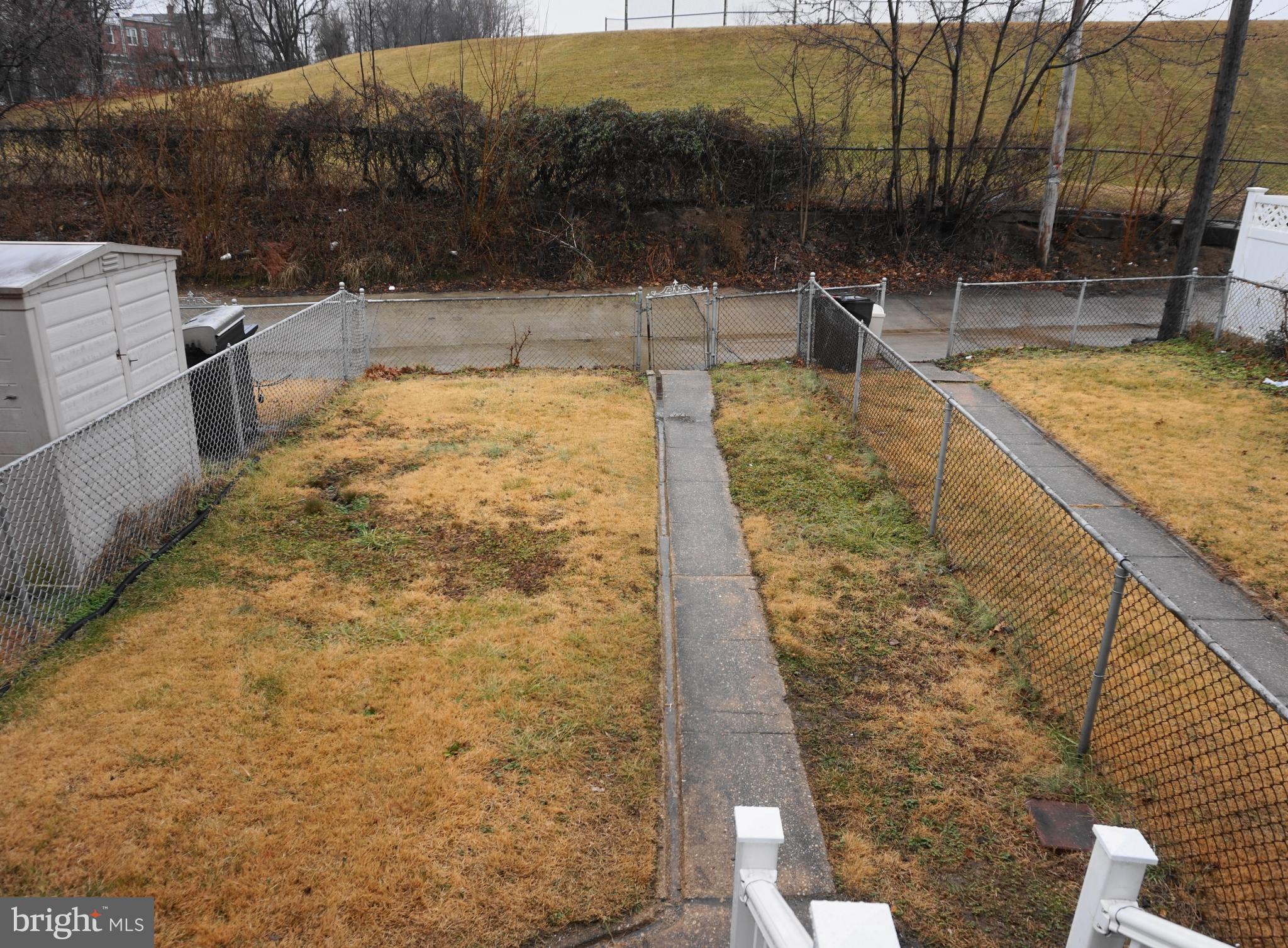 7459 School Avenue Dundalk, MD 21222 - Photo 23 of 23 a view of a swimming pool with a patio
