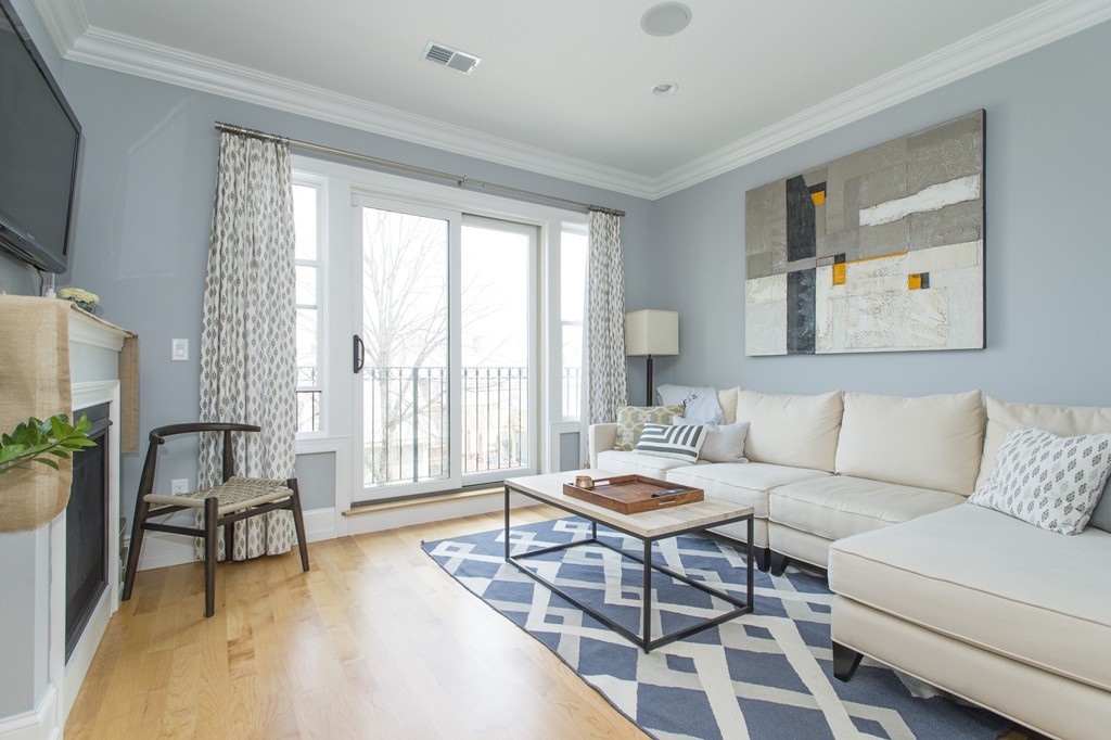 37 P Street, Unit 4 Boston, MA 02127 - Photo 1 of 13 a living room with furniture and a flat screen tv
