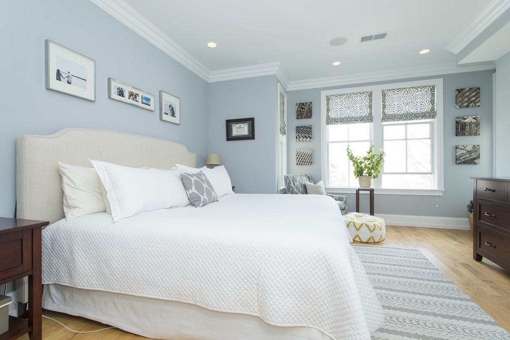 37 P Street, Unit 4 Boston, MA 02127 - Photo 6 of 13 a bedroom with a large bed and a window