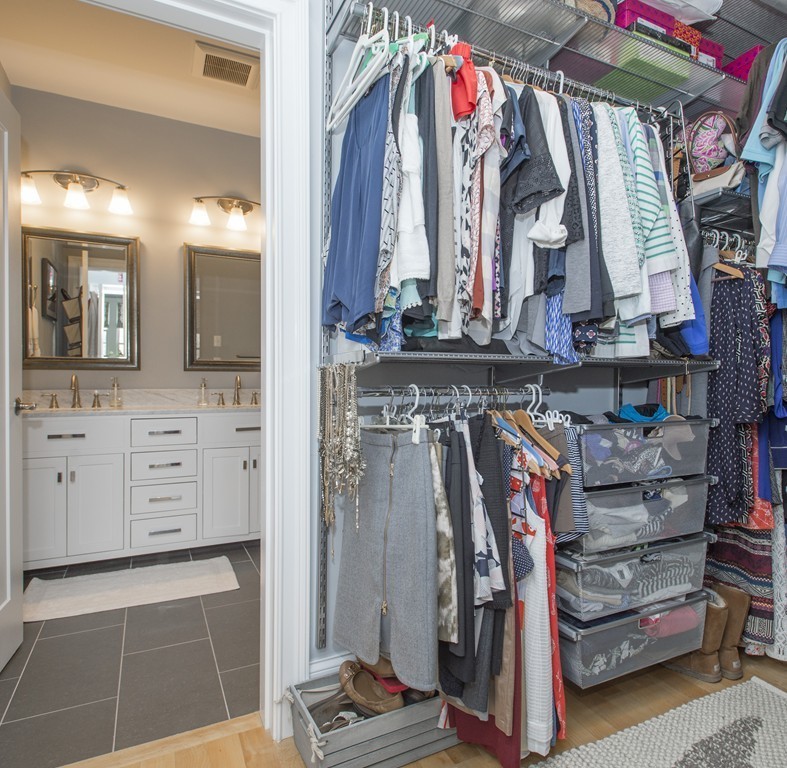 37 P Street, Unit 4 Boston, MA 02127 - Photo 7 of 13 a view of walk in closet with clothes and shoes
