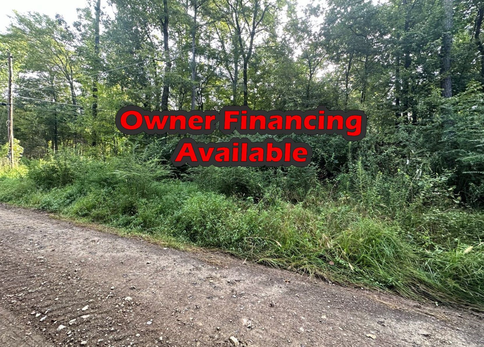 a street sign that is sitting on a road