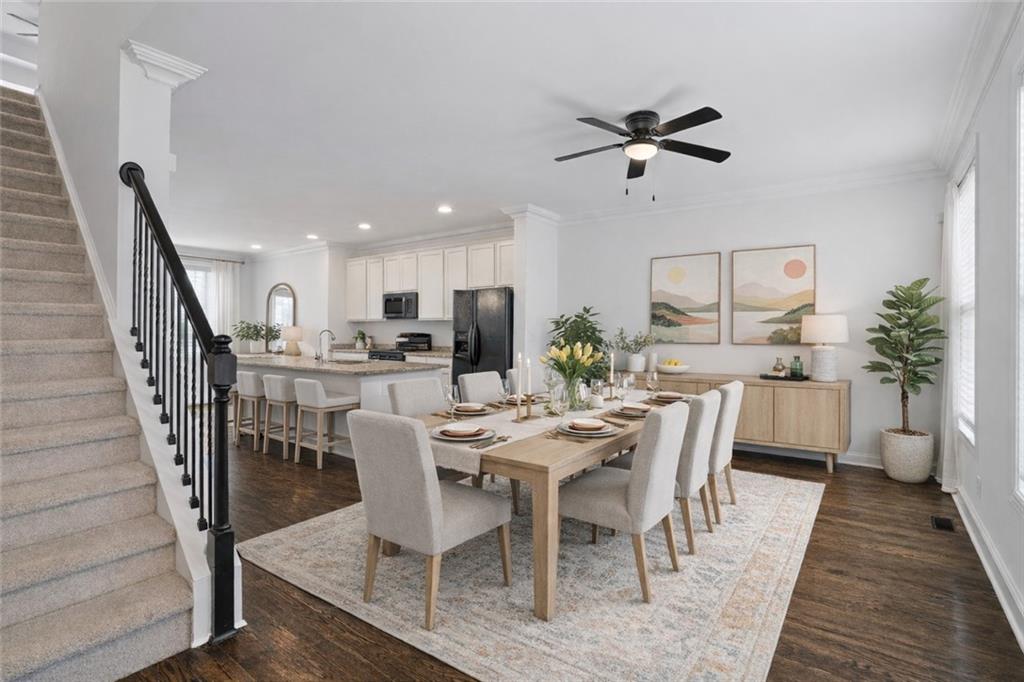 7054 Elmwood Ridge Court Atlanta, GA 30340 - Photo 2 of 44 a dining room with furniture and window