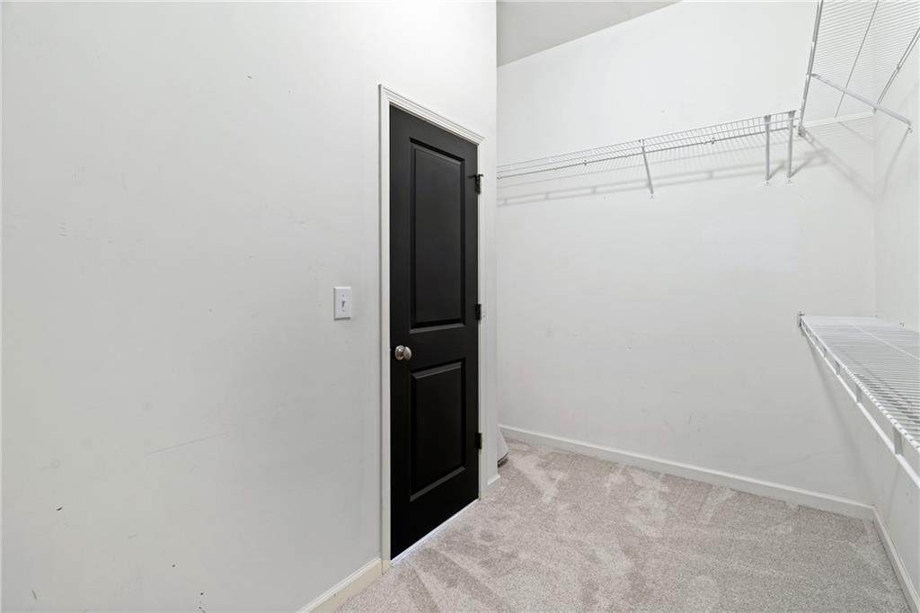 7054 Elmwood Ridge Court Atlanta, GA 30340 - Photo 21 of 44 a view of closet