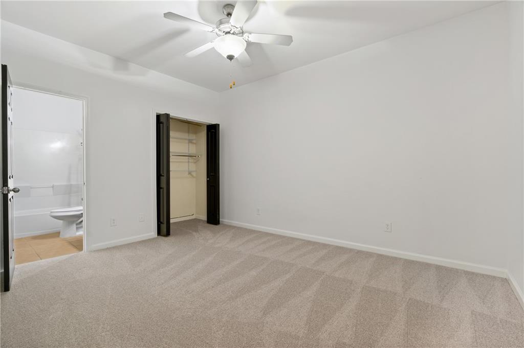 7054 Elmwood Ridge Court Atlanta, GA 30340 - Photo 27 of 44 an empty room with a bathroom