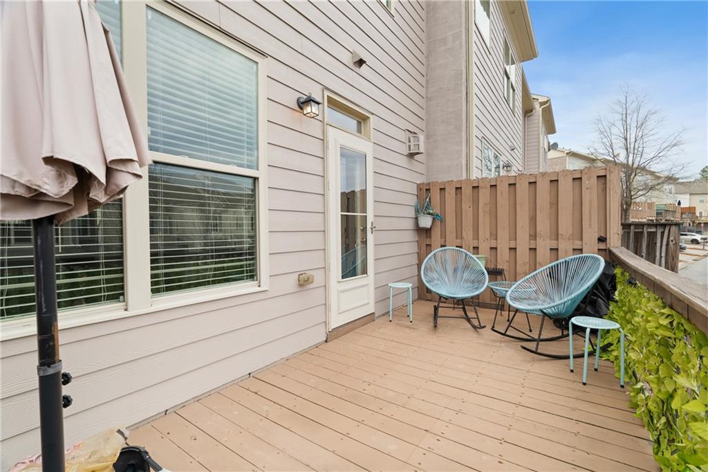 7054 Elmwood Ridge Court Atlanta, GA 30340 - Photo 30 of 44 a view of a two chairs in the balcony