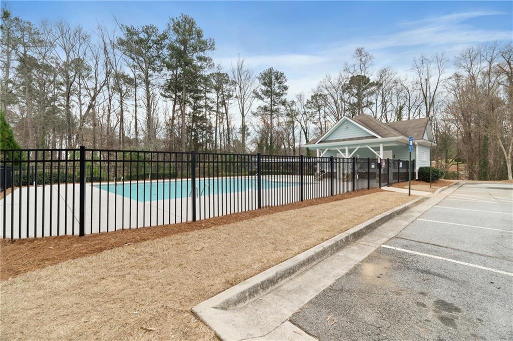 7054 Elmwood Ridge Court Atlanta, GA 30340 - Photo 42 of 44 a view of a house with a backyard