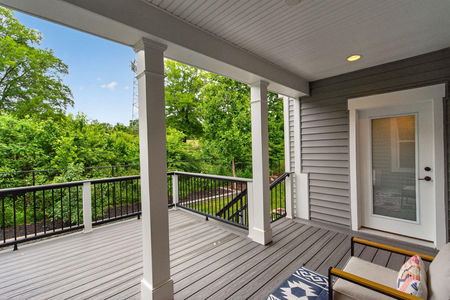 6213 Mcconnell Lane Springfield, VA 22152 - Photo 38 of 39 a view of balcony with wooden floor and outdoor space