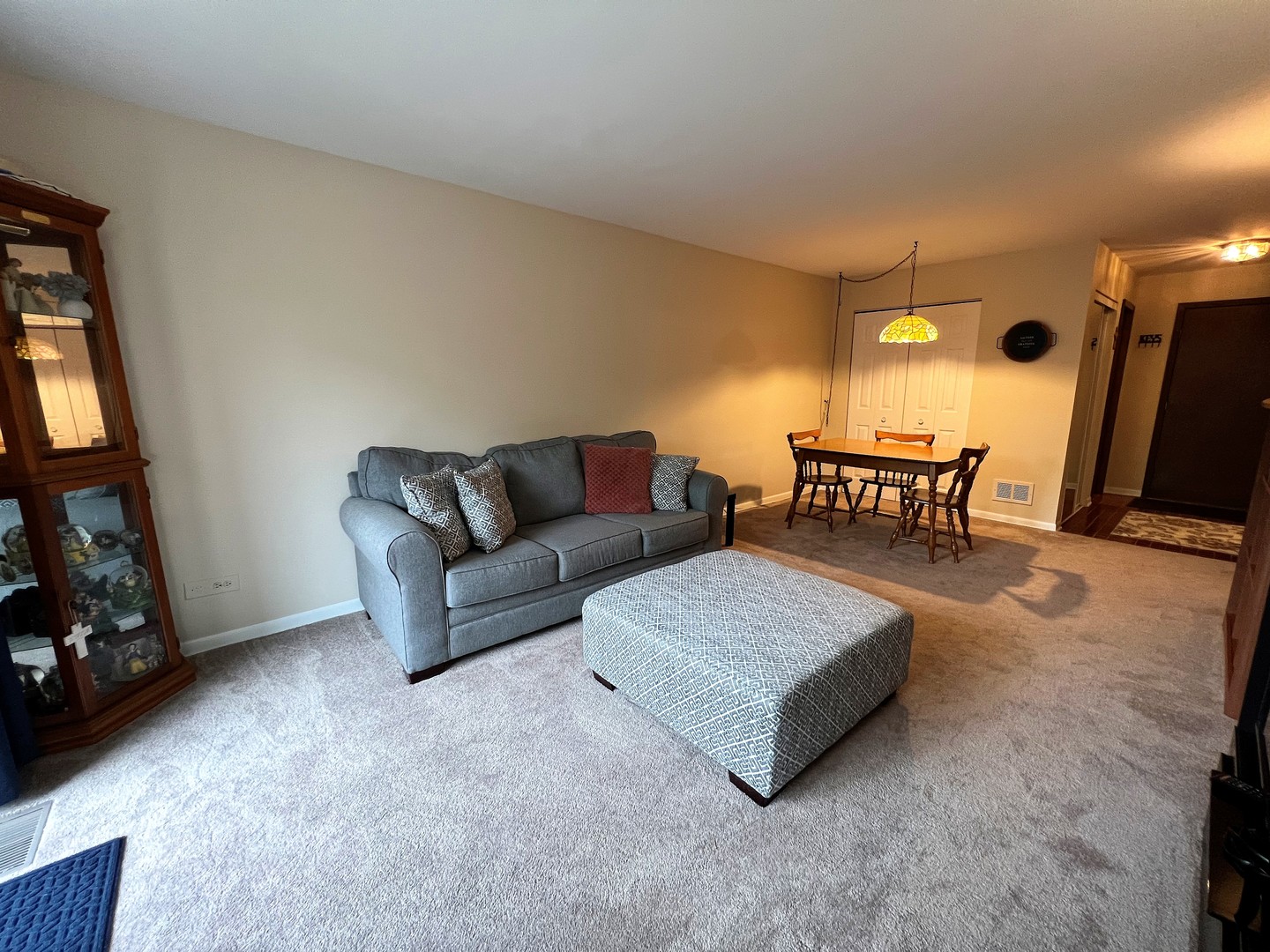2311 183rd Street, Unit 206B Homewood, IL 60430 - Photo 10 of 26 a living room with furniture and a flat screen tv