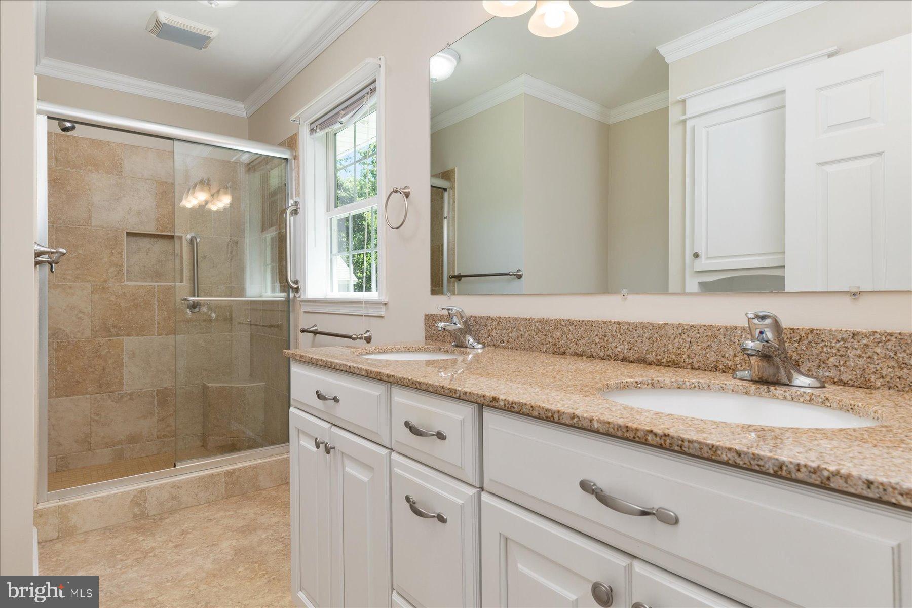 109 Calvert Road Stevensville, MD 21666 - Photo 37 of 41 Elegant bathroom with modern finishes.