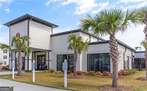 a front view of a house with swimming pool