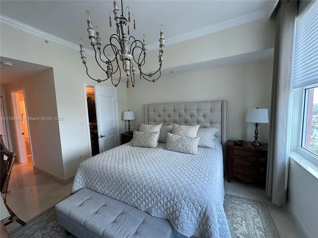 a bedroom with a window