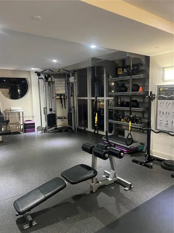 a view of a room with gym equipment