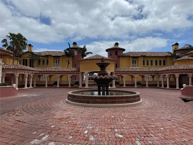 a front view of a building with street view