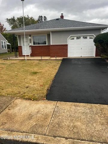 a view of swimming pool with outdoor seating
