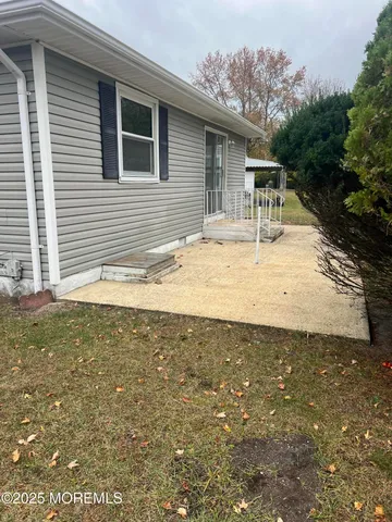 a view of a house with a patio