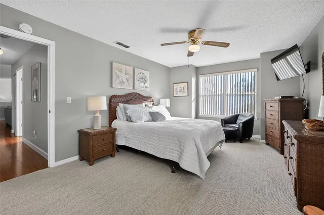 a bedroom with a bed furniture and a window