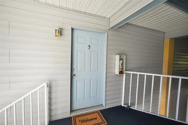 a view of a terrace with a garden