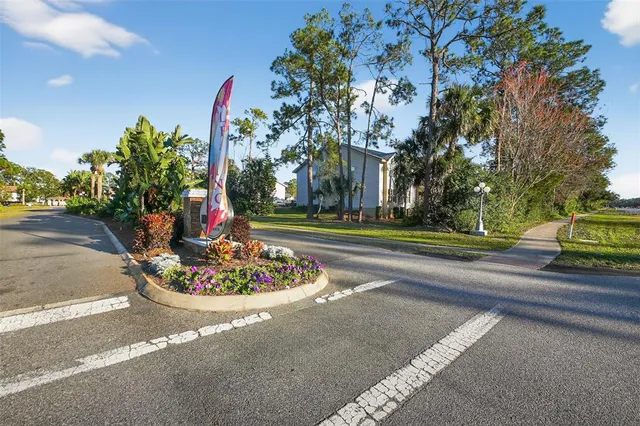 a view of street with parked cars