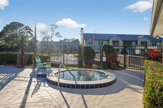 a view of a house with sitting area and furniture