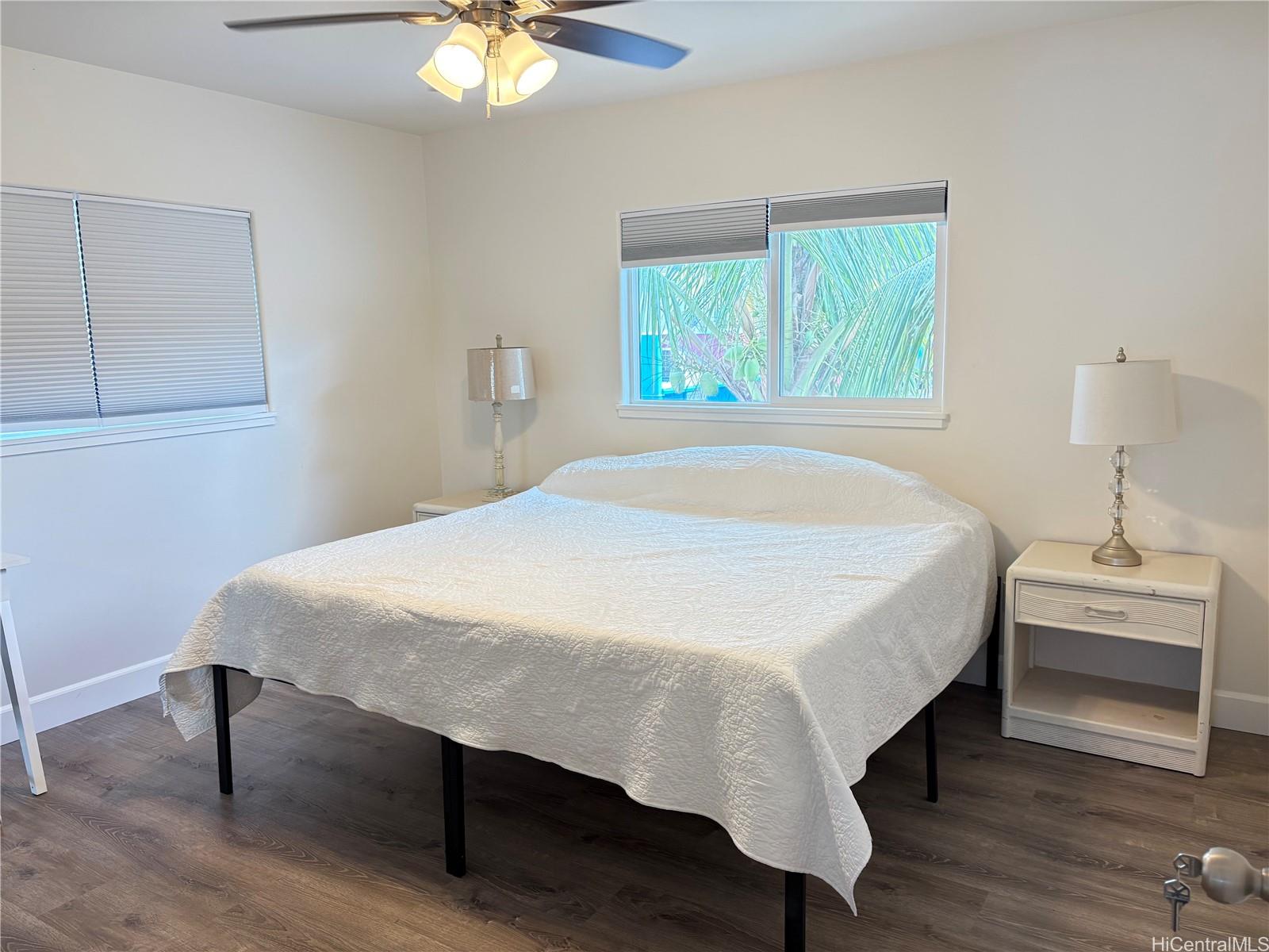 85-075 Waianae Valley Road, Unit B Waianae, HI 96792 - Photo 5 of 11 a bedroom with a bed and a table