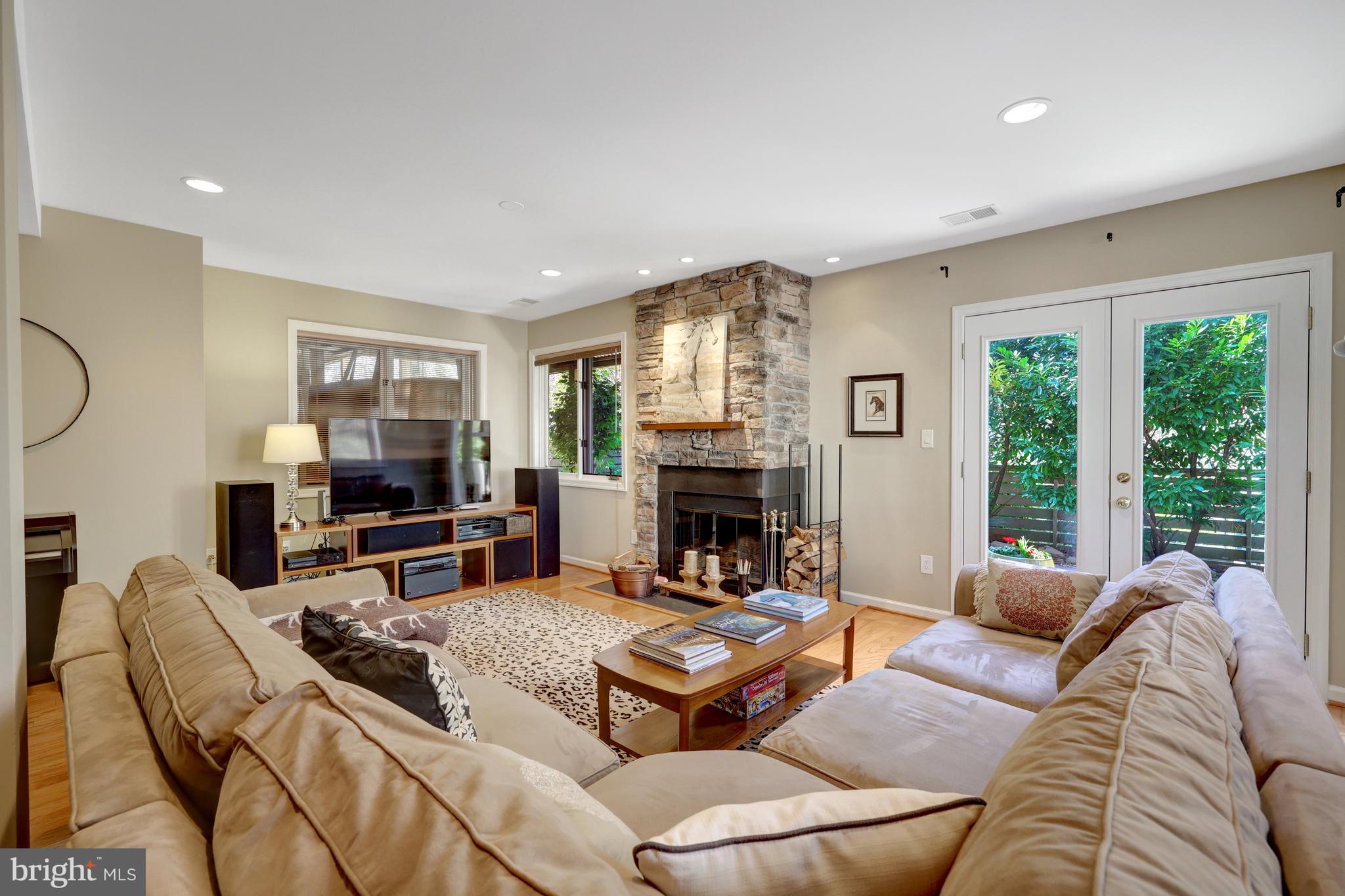 11122 Lakespray Way Reston, VA 20191 - Photo 56 of 77 French doors lead from the rec room to the patio.