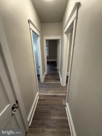 a view of a hallway view with staircase