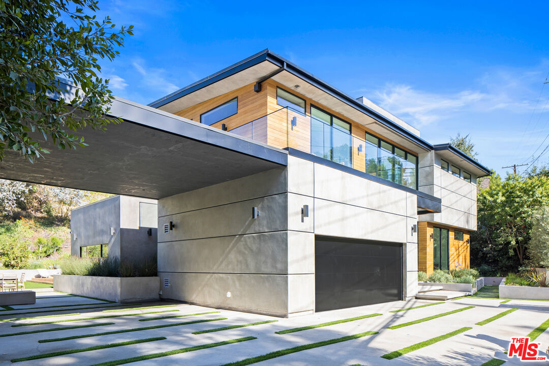 2814 Roscomare Road Los Angeles, CA 90077 - Photo 3 of 35 a view of a building with a street