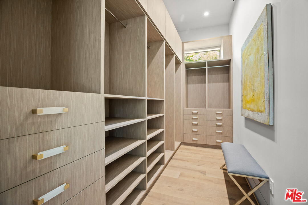 2814 Roscomare Road Los Angeles, CA 90077 - Photo 21 of 35 a bathroom with a bathtub and a shower