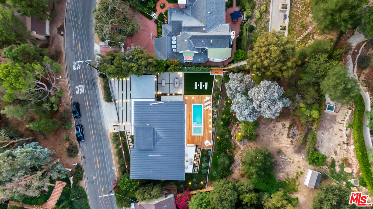 2814 Roscomare Road Los Angeles, CA 90077 - Photo 34 of 35 an aerial view of a house with a yard and tree s