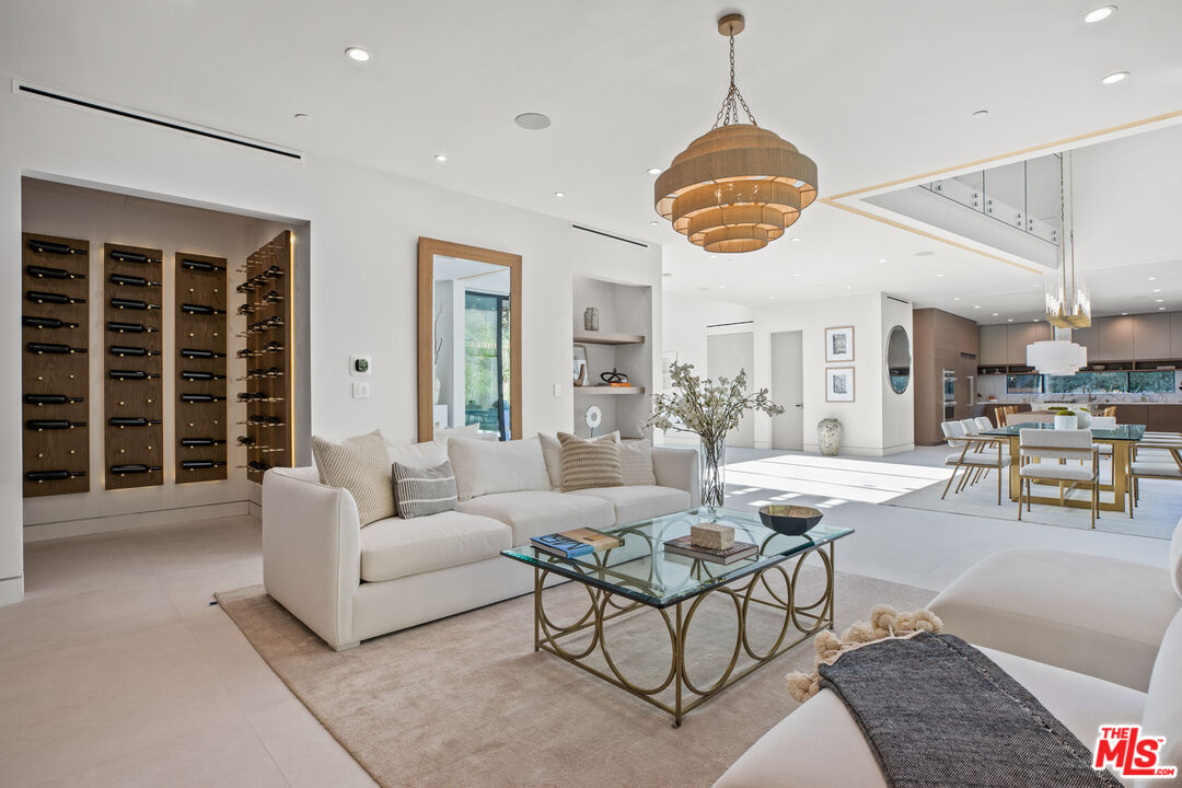 2814 Roscomare Road Los Angeles, CA 90077 - Photo 7 of 35 a living room with furniture and a large window