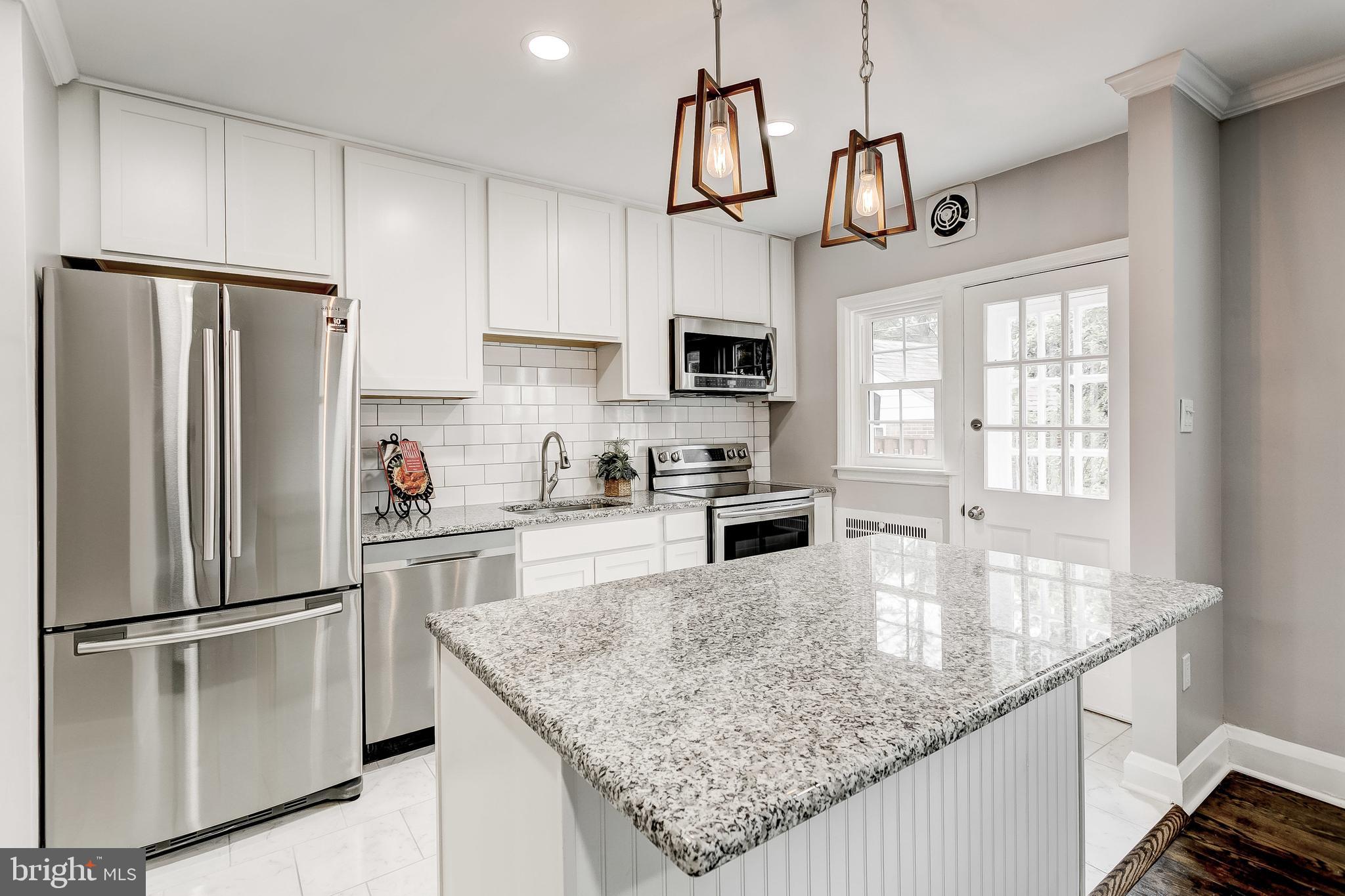 225 Murdock Road Baltimore, MD 21212 - Photo 6 of 42 New Granite Counter tops & Large Cabinets!