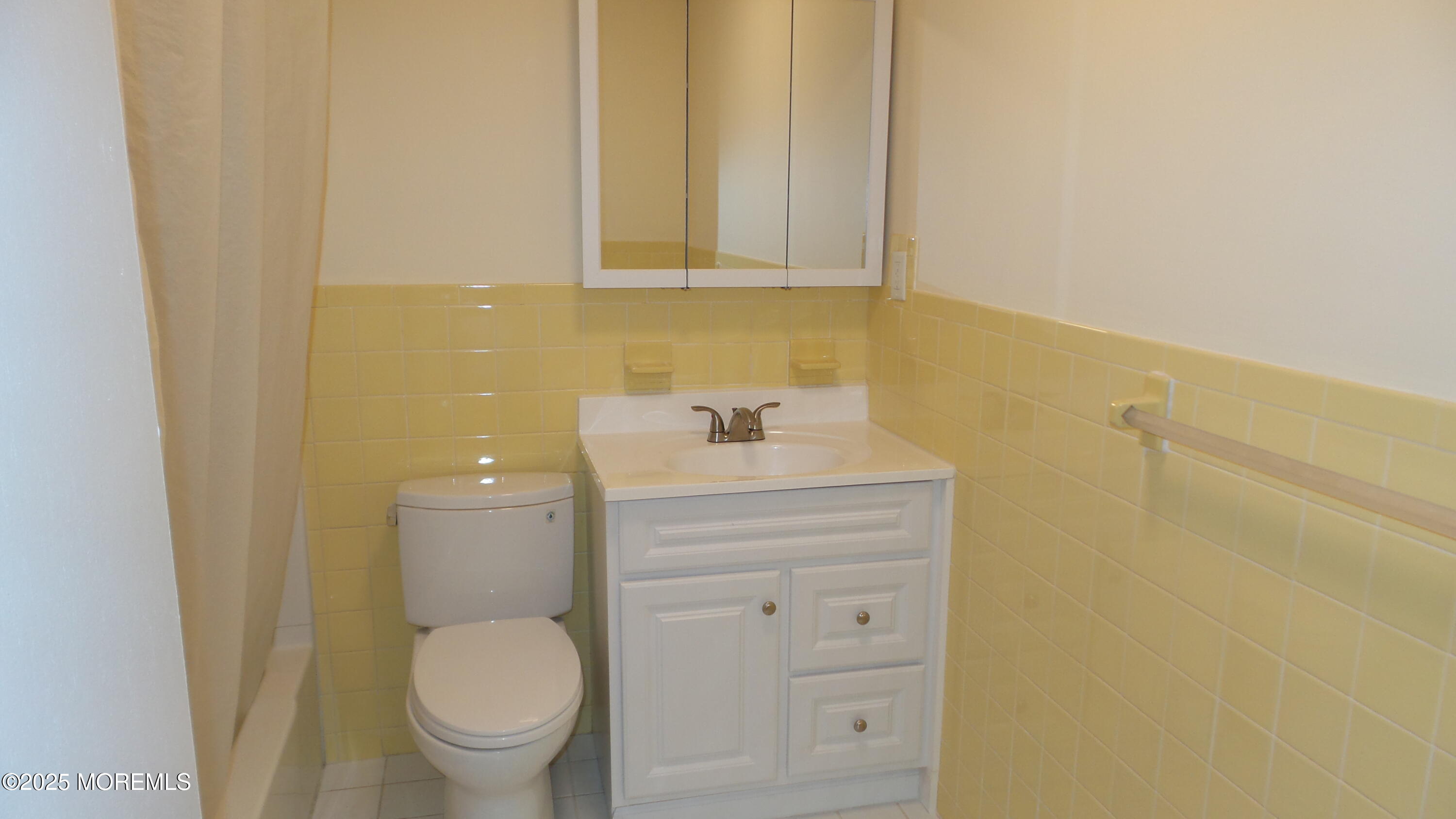 2 Briar Mills Drive Brick, NJ 08724 - Photo 13 of 14 a bathroom with a sink toilet and vanity