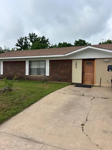 front view of house with a yard