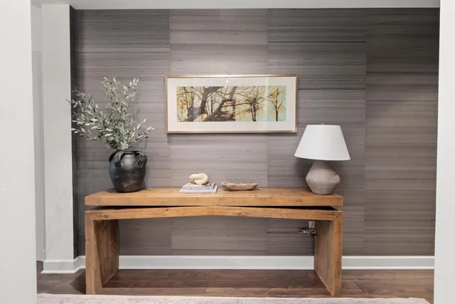 a view of table chair and wooden floor