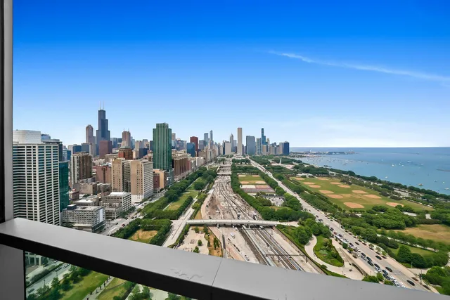 a view of a city with tall buildings