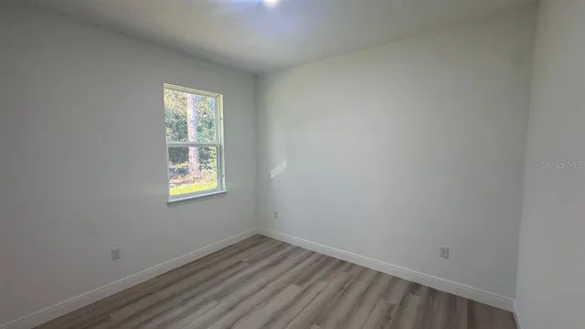 an empty room with a window