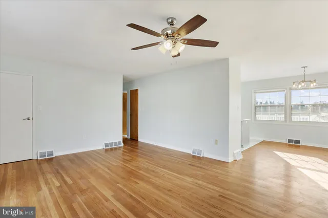a view of a storage & utility room with two washing machine