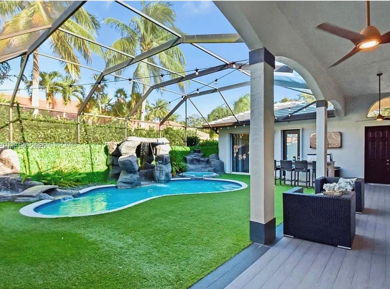 354 Mallard Road, Unit O Weston, FL 33327 - Photo 22 of 29 a view of a swimming pool with a patio