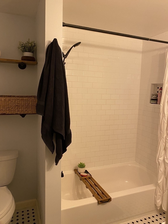 10 Erick Road, Unit 5 Mansfield, MA 02048 - Photo 13 of 24 a bathroom with a shower and a toilet