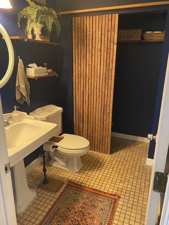 10 Erick Road, Unit 5 Mansfield, MA 02048 - Photo 18 of 24 a bathroom with a sink and a toilet