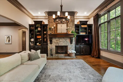 a outdoor living space with furniture and a fireplace