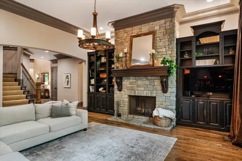 a bedroom with a large bed and a couch