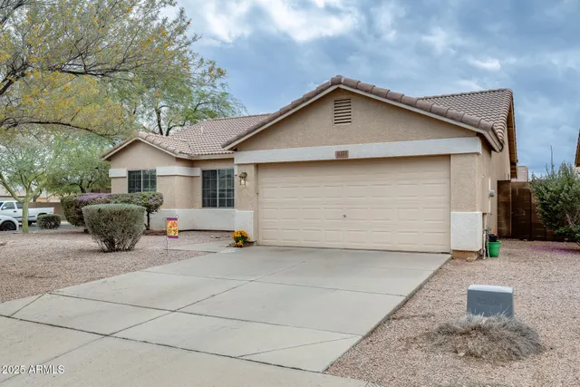 front view of a house with a patio