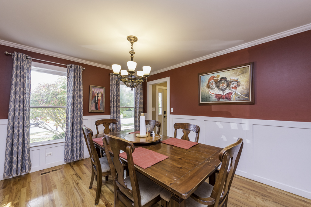 3482 Ellis Avenue Gurnee, IL 60031 - Photo 14 of 46 a view of a dining room with furniture window and wooden floor