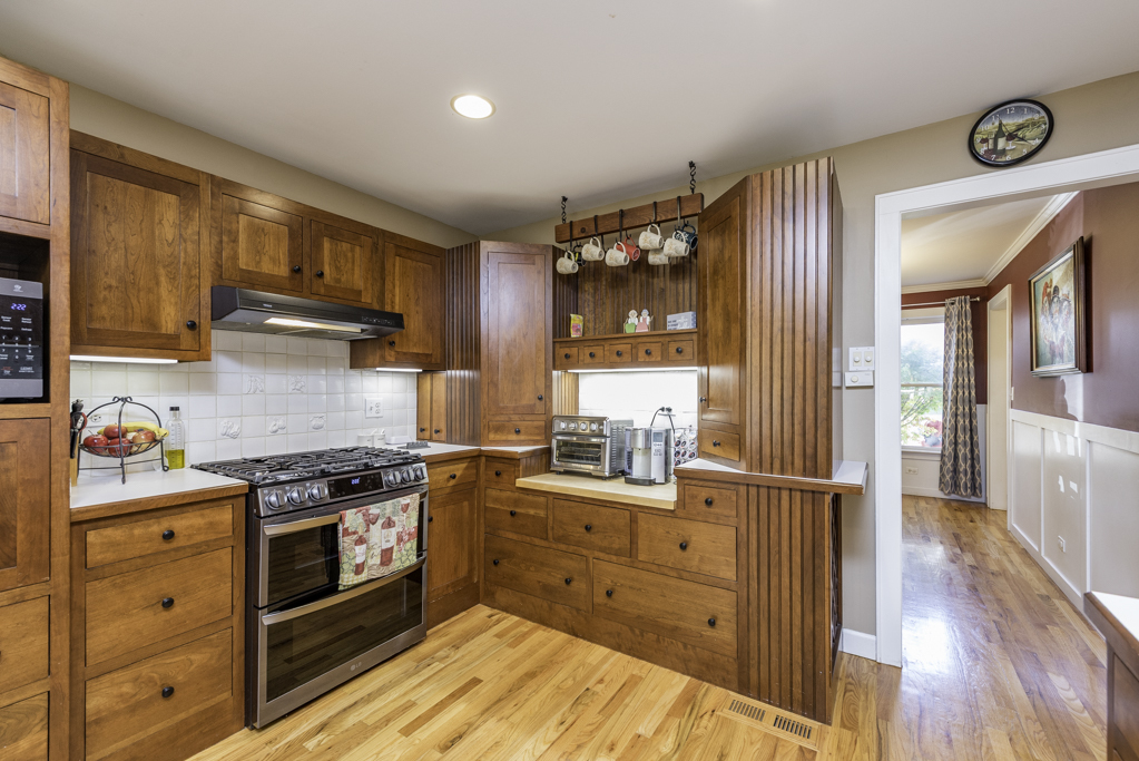 3482 Ellis Avenue Gurnee, IL 60031 - Photo 18 of 46 a kitchen with stainless steel appliances granite countertop a stove and a sink