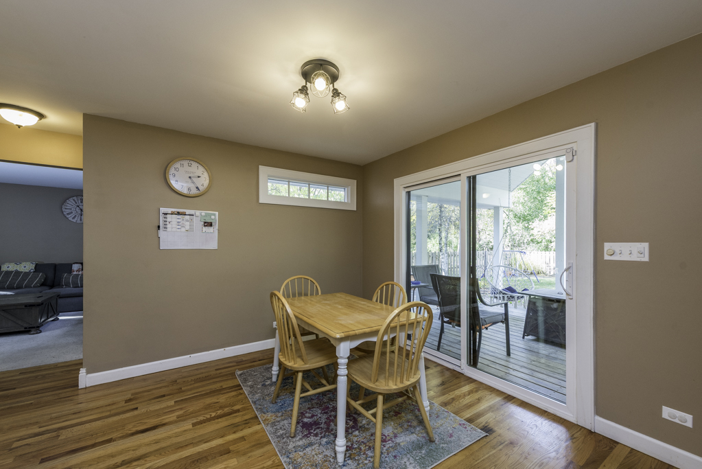 3482 Ellis Avenue Gurnee, IL 60031 - Photo 20 of 46 a view of a dining room with furniture window and wooden floor