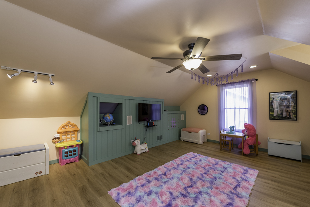 3482 Ellis Avenue Gurnee, IL 60031 - Photo 30 of 46 a bedroom with furniture and a flat screen tv