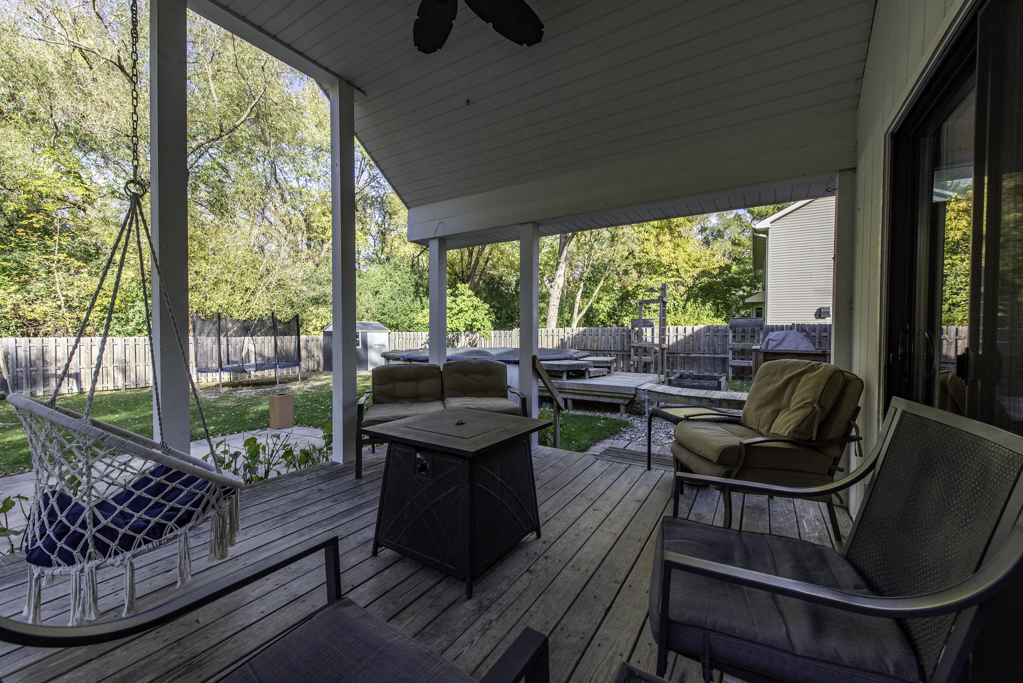 3482 Ellis Avenue Gurnee, IL 60031 - Photo 38 of 46 a living room with furniture and a floor to ceiling window